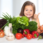 Kid loving her veggies