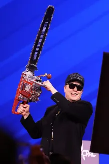 Elon Musk with his chainsaw